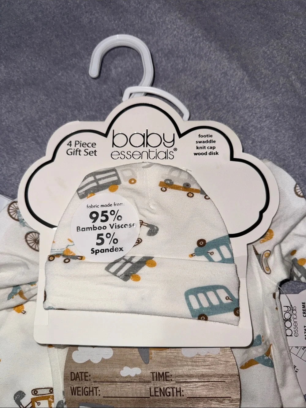 Footie, swaddle, knit cap, wood disk 4 piece gift set